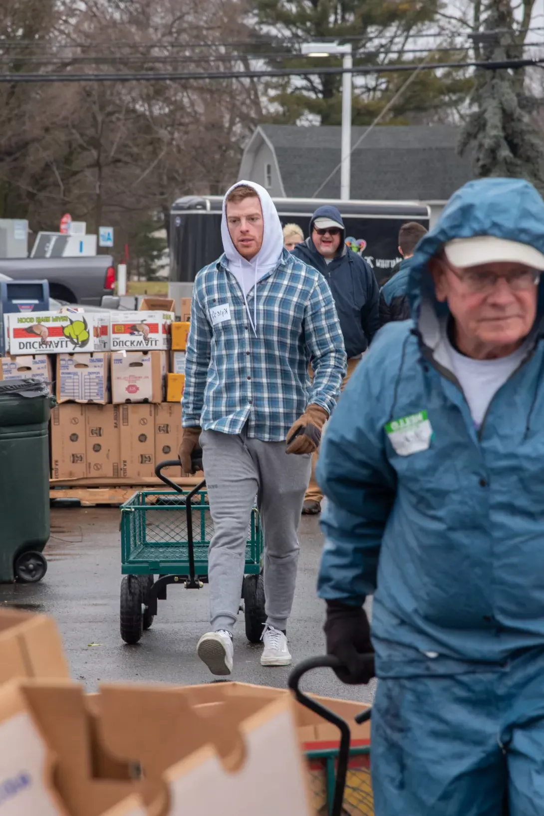 student volunteering food distribution